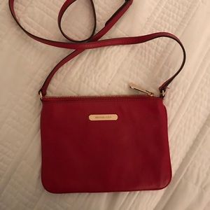 Red Michael Kors crossbody bag